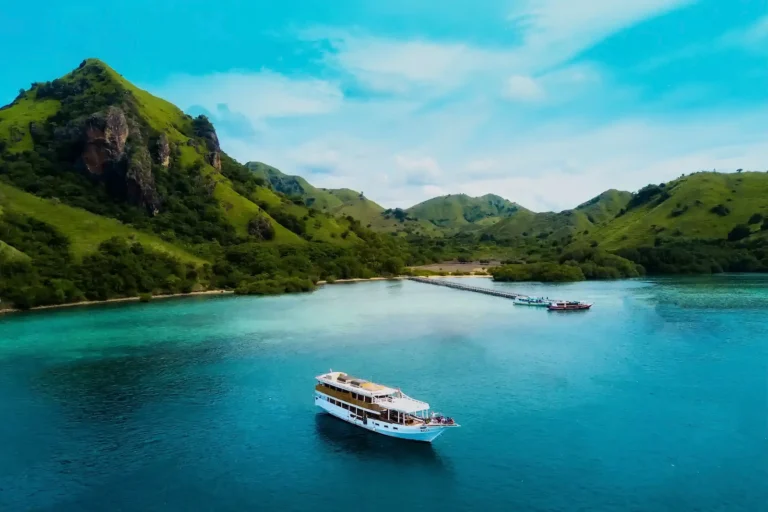 Drone view of Manjarite Beach with coral-filled shallow waters.