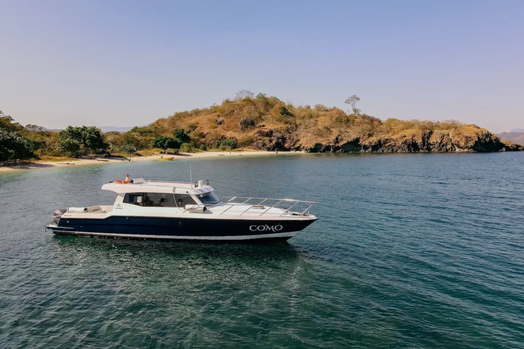 Como boat docked at Sture Beach ready for island hopping.