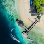 kelor-island-aerial-view-snorkeling-hill-hike.webp