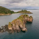 Aerial photo of Sture Beach captured from above a nearby islet.